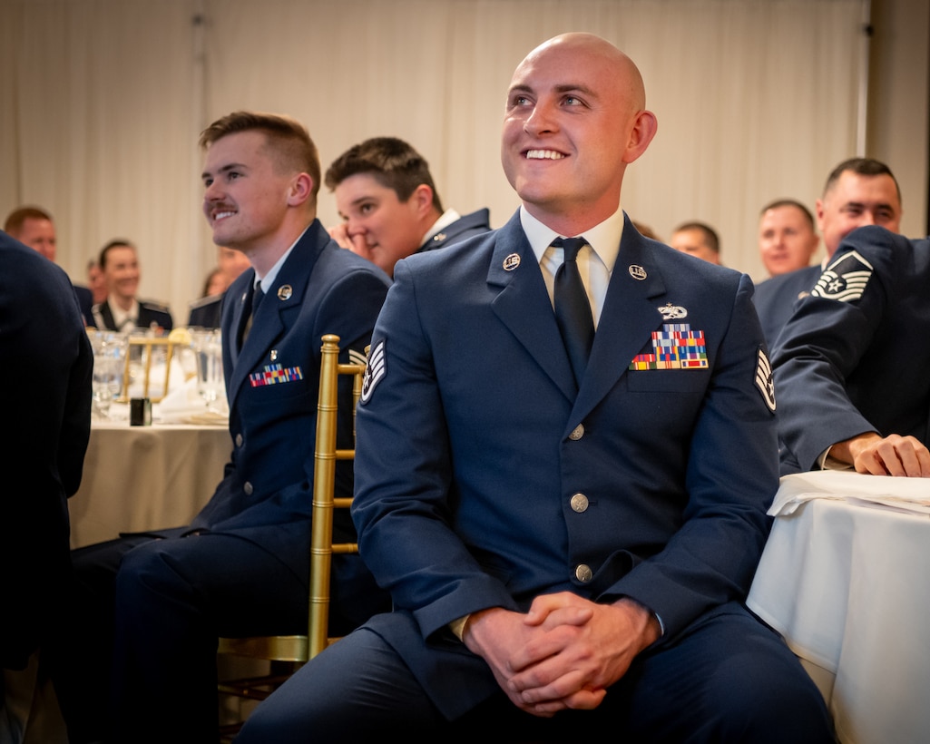 Staff Sgt. Lucas Bradshaw, the Kentucky Air National Guard’s 2026 Non-Commissioned Officer of the Year, is recognized during the Airman’s Gala at Wildwood Country Club in Louisville, Ky., March 14, 2026. The Gala celebrated wing Airmen who displayed exceptional performance and community engagement in 2025. (U.S. Air National Guard photo by Master Sgt. Joshua Horton)