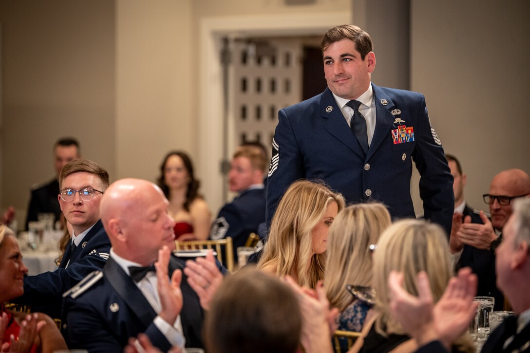 Senior Master Sgt. Dallas Stoll, the Kentucky Air National Guard’s 2026 Non-Commissioned Officer of the Year, is recognized during the Airman’s Gala at Wildwood Country Club in Louisville, Ky., March 14, 2026. The Gala celebrated wing Airmen who displayed exceptional performance and community engagement in 2025. (U.S. Air National Guard photo by Master Sgt. Joshua Horton)