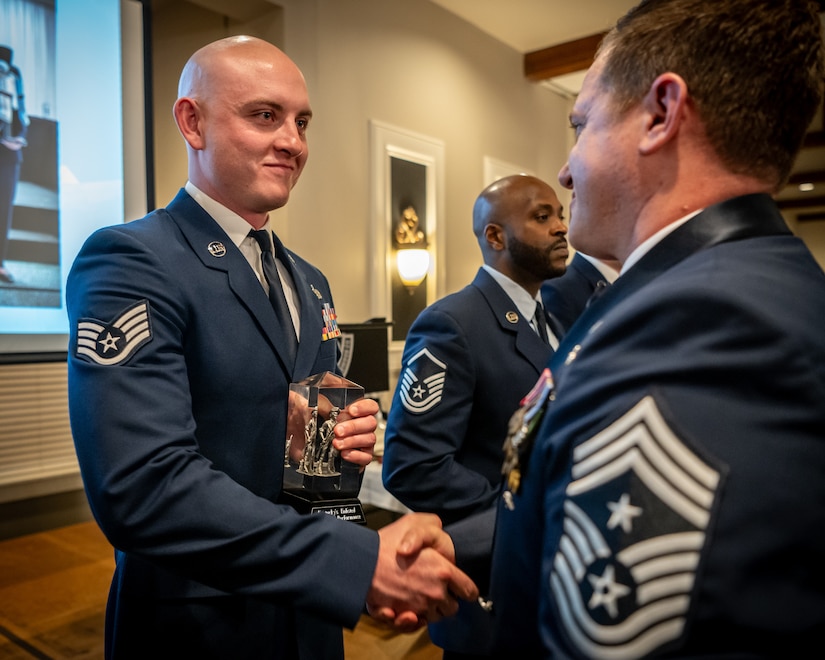 Staff Sgt. Lucas Bradshaw, the Kentucky Air National Guard’s 2026 Non-Commissioned Officer of the Year, is recognized during the Airman’s Gala at Wildwood Country Club in Louisville, Ky., March 14, 2026. The Gala celebrated wing Airmen who displayed exceptional performance and community engagement in 2025. (U.S. Air National Guard photo by Master Sgt. Joshua Horton)