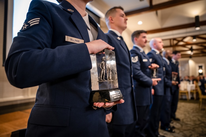 The Kentucky Air National Guard recognizes the 123rd Airlift Wing’s top Airmen for 2026 during the Airman’s Gala at Wildwood Country Club in Louisville, Ky., March 14, 2026. Senior Airman Ethan Greco, Staff Sgt. Lucas Bradshaw and Senior Master Sgt. Dallas Stoll were honored in the Airman, NCO and Senior NCO categories, while Master Sgt. Josh Pence was named First Sergeant of the Year. (U.S. Air National Guard photo by Master Sgt. Joshua Horton)