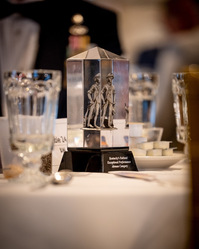 The Kentucky Air National Guard recognizes the 123rd Airlift Wing’s top Airmen for 2026 during the Airman’s Gala at Wildwood Country Club in Louisville, Ky., March 14, 2026. Senior Airman Ethan Greco, Staff Sgt. Lucas Bradshaw and Senior Master Sgt. Dallas Stoll were honored in the Airman, NCO and Senior NCO categories, while Master Sgt. Josh Pence was named First Sergeant of the Year. (U.S. Air National Guard photo by Master Sgt. Joshua Horton)