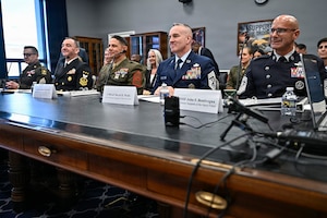 Chief Master Sgt. of the Space Force John Bentivegna, right, Chief Master Sgt. of the Air Force David Wolfe, second from right, Sgt. Maj. of the Marine Corps Carlos Ruiz, Master Chief Petty Officer of the Navy John Perryman and Sgt. Maj. of the Army Michael Weimer listen to opening remarks during a House Appropriations Subcommittee hearing about military quality of life, on Capitol Hill in Washington, D.C., March 25, 2026. (U.S. Air Force photo by Eric Dietrich)