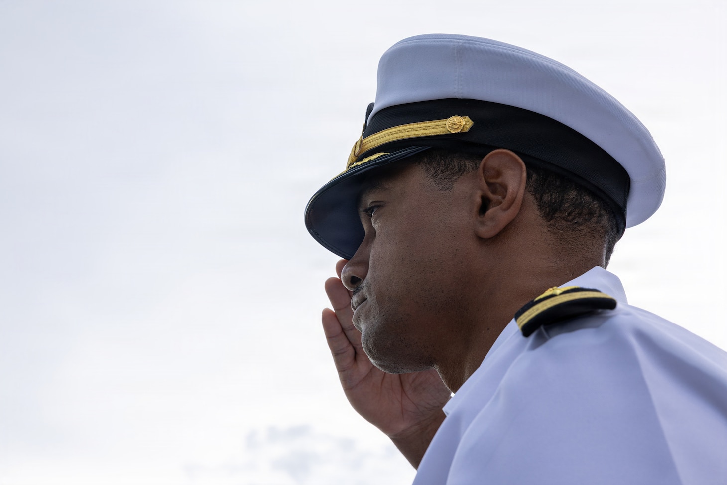 U.S. Navy Cmdr. Paul Richardson, commanding officer of Arleigh Burke-class guided-missile destroyer USS Fitzgerald (DDG 62) salutes the Leeuwin-class survey ship HMAS Leeuwin (A 245) during a fleet review as a part of Exercise Kakadu in Sydney, March 21, 2026.