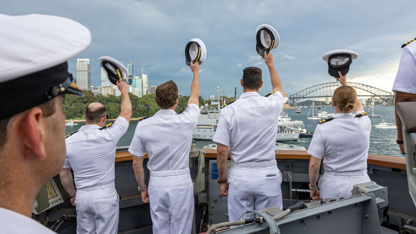 U.S. Navy Sailors assigned to Arleigh Burke-class guided-missile destroyer USS Fitzgerald (DDG 62) render honors to the Leeuwin-class survey ship HMAS Leeuwin (A 245) during a fleet review as a part of Exercise Kakadu in Sydney, March 21, 2026.
