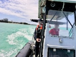 Members of the U.S. Coast Guard Sector Boarding Team conduct a joint patrol with the CNMI Department of Public Safety - Marine Unit personnel on March 20, 2026, in Saipan.  From March 18-22, conducted joint underway and shoreside operations alongside the CNMI Department of Public Safety, Saipan Marine Unit, and Saipan Customs and Biosecurity, reinforcing direct lines of communication and cooperation that strengthen maritime domain awareness across the CNMI's waters and surrounding exclusive economic zone. (U.S. Coast Guard photo by Petty Officer 1st Class Chris Farrell)