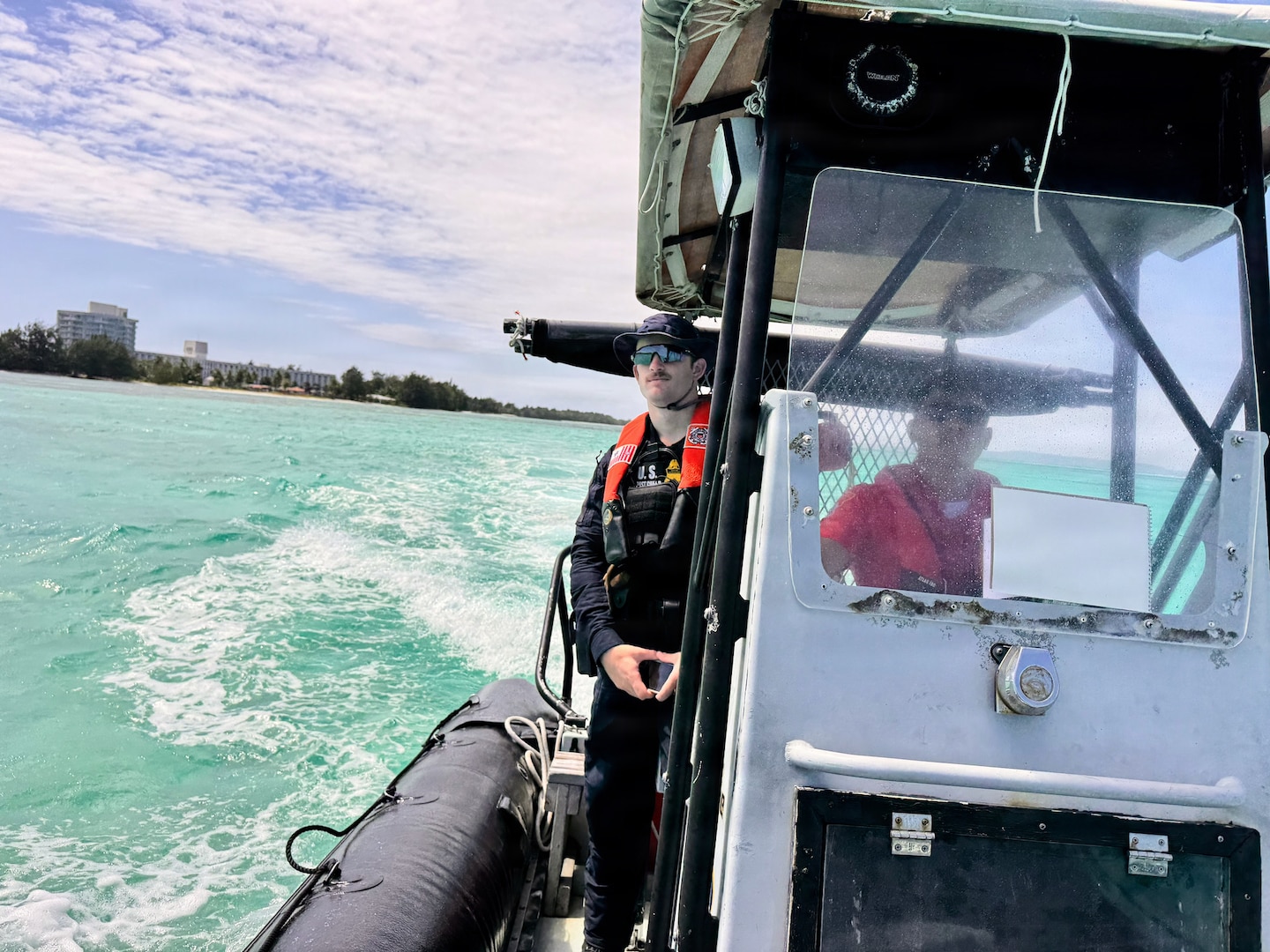 Members of the U.S. Coast Guard Sector Boarding Team conduct a joint patrol with the CNMI Department of Public Safety - Marine Unit personnel on March 20, 2026, in Saipan.  From March 18-22, conducted joint underway and shoreside operations alongside the CNMI Department of Public Safety, Saipan Marine Unit, and Saipan Customs and Biosecurity, reinforcing direct lines of communication and cooperation that strengthen maritime domain awareness across the CNMI's waters and surrounding exclusive economic zone. (U.S. Coast Guard photo by Petty Officer 1st Class Chris Farrell)