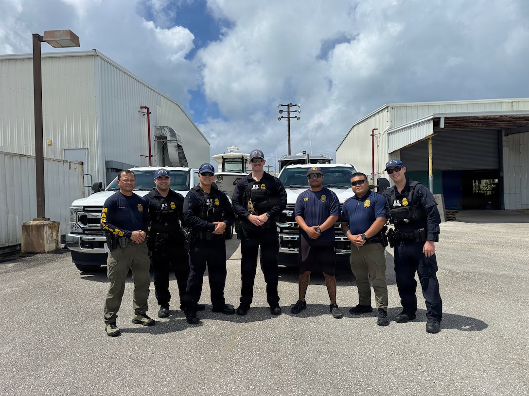 Members of the U.S. Coast Guard Sector Boarding Team stand for a photo with CNMI Customs and Biosecurity personnel on March 19, 2026, in Saipan.  From March 18-22, conducted joint underway and shoreside operations alongside the CNMI Department of Public Safety, Saipan Marine Unit, and Saipan Customs and Biosecurity, reinforcing direct lines of communication and cooperation that strengthen maritime domain awareness across the CNMI's waters and surrounding exclusive economic zone. (U.S. Coast Guard photo by Petty Officer 1st Class Chris Farrell)