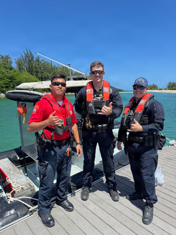 Members of the U.S. Coast Guard Sector Boarding Team stand for a photo with CNMI law enforcement partners on March 20, 2026, in Saipan.  From March 18-22, conducted joint underway and shoreside operations alongside the CNMI Department of Public Safety, Saipan Marine Unit, and Saipan Customs and Biosecurity, reinforcing direct lines of communication and cooperation that strengthen maritime domain awareness across the CNMI's waters and surrounding exclusive economic zone. (U.S. Coast Guard photo by Petty Officer 1st Class Chris Farrell)