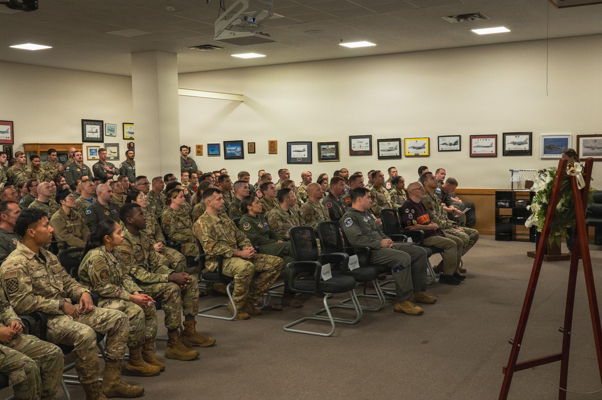 U.S. Air Force Airmen attend a vigil held by the 909th Air Refueling Squadron at Kadena Air Base, Japan, March 20, 2026.