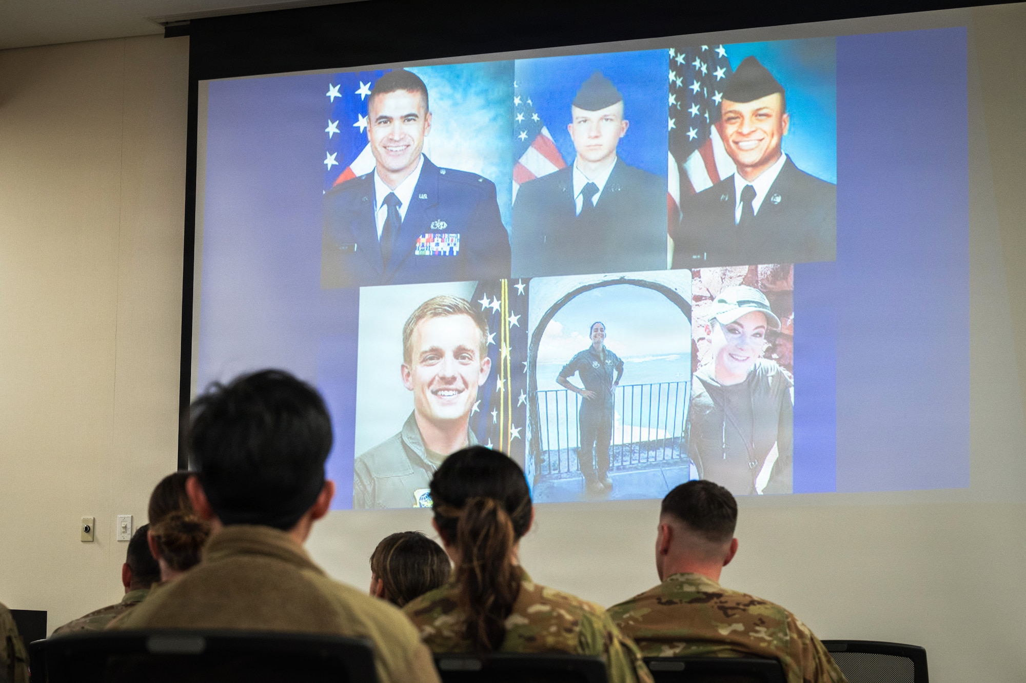 U.S. Air Force Airmen attend a vigil held by the 909th Air Refueling Squadron at Kadena Air Base, Japan, March 20, 2026.