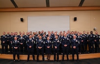 Airmen from the 104th Fighter Wing, 102nd Intelligence Wing, 143rd Airlift Wing and 224th Security Forces Squadron pose for a group photo at the conclusion of the Massachusetts Air National Guard’s inaugural Senior Noncommissioned Officer, or SNCO, Professional Development Course, March 20, 2026, at Camp Nett, Niantic, Connecticut.