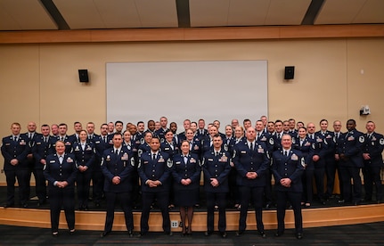 Airmen from the 104th Fighter Wing, 102nd Intelligence Wing, 143rd Airlift Wing and 224th Security Forces Squadron pose for a group photo at the conclusion of the Massachusetts Air National Guard’s inaugural Senior Noncommissioned Officer, or SNCO, Professional Development Course, March 20, 2026, at Camp Nett, Niantic, Connecticut.