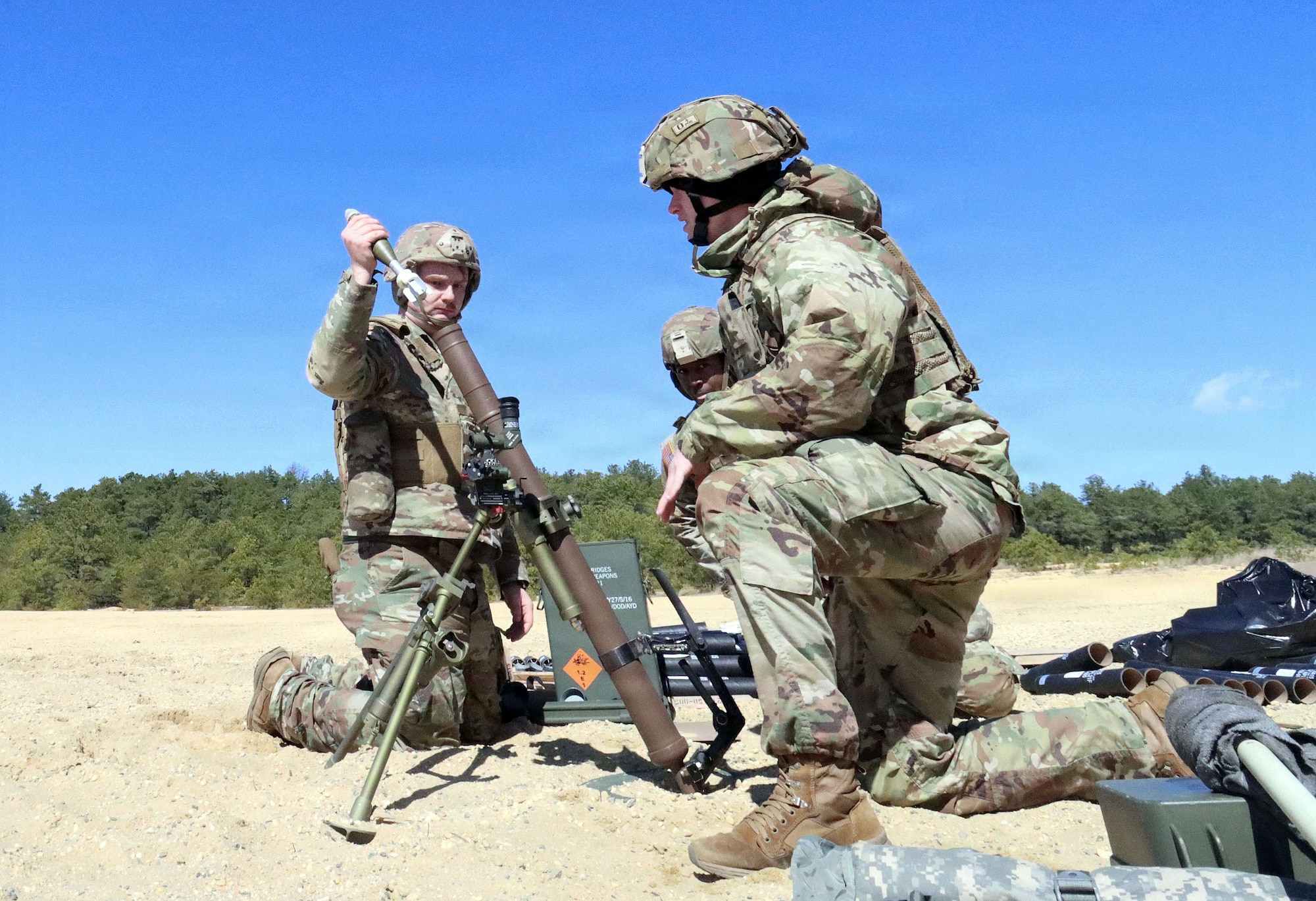 U.S infantry Soldiers assigned to the 1st Battalion, 175th Infantry Regiment, Maryland Army National Guard, conduct mortar training during a field training exercise at Joint Base McGuire-Dix-Lakehurst, N.J., March 15, 2026. The FTX focused on training in preparation for upcoming deployments, team development and unit synchronization. (U.S. Army photo by Steven Roussel)