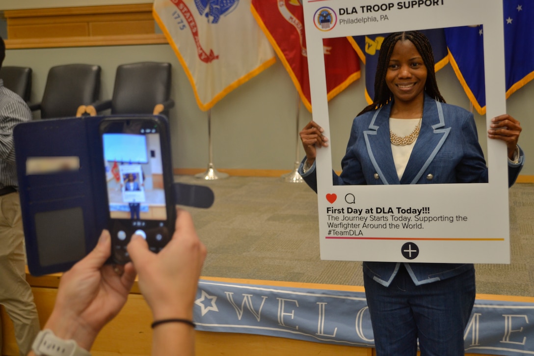 A new DLA Troop Support team member celebrates the completion of their first day, proudly joining the ranks of civilian service after taking the Oath of Office. This milestone signifies their new commitment to supporting our nation's warfighters and enhancing national security. Their journey with DLA Troop Support has officially begun