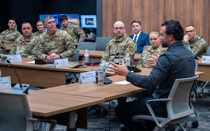 Under Secretary of the Air Force Matt Lohmeier engages in conversation with leadership from Air Force Materiel Command and the National Air and Space Intelligence Center during his visit to Wright-Patterson Air Force Base, Ohio, March 23, 2026.