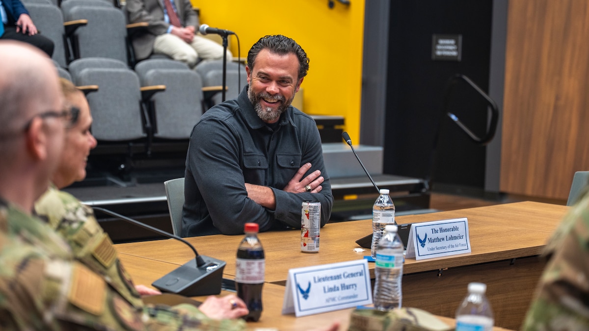 Person at a table talking