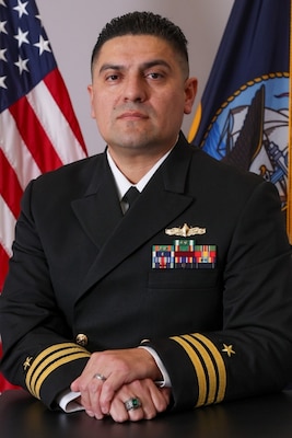 260209-N-N0443-3005 SAN DIEGO (Feb. 09, 2026) Official portrait of Cmdr. Carlos Carballo. (U.S. Navy photo)