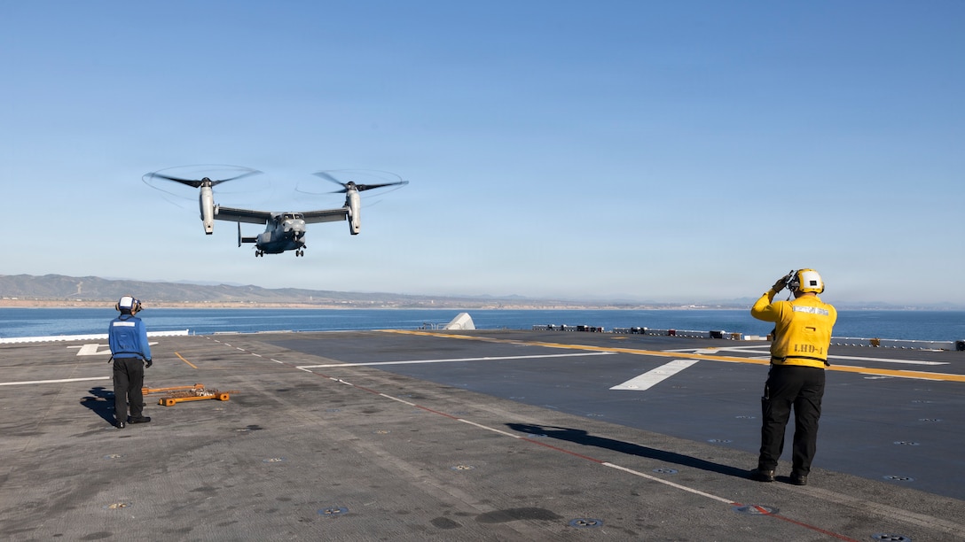 A U.S. Marine Corps MV-22B Osprey attached to Marine Medium Tiltrotor Squadron (VMM) 163 (Reinforced), 11th Marine Expeditionary Unit, prepares to land aboard Wasp-class amphibious assault ship USS Boxer (LHD 4) during flight operations in the Pacific Ocean, March 19, 2026. The 11th MEU is currently underway aboard the Boxer Amphibious Ready Group in the U.S. 3rd Fleet area of operations demonstrating the United States’ long-term commitment to a free and open Indo-Pacific. (U.S. Marine Corps photo by Cpl. Oliver Nisbet)