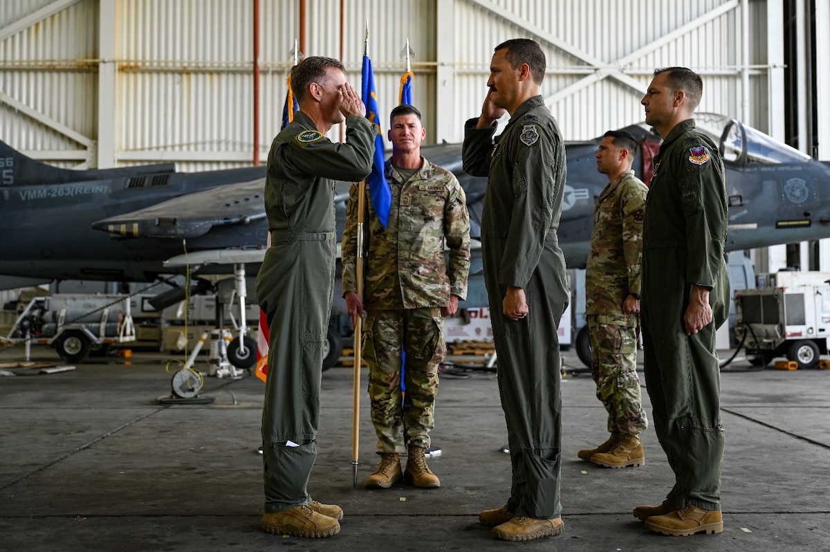 U.S. Air Force Col. Benjamin A. Donberg, right, 346th Air Expeditionary Wing outbound commander, relinquishes command during a change of command ceremony at Ceiba, Puerto Rico, March 15, 2026. U.S. military forces are deployed to the Caribbean in support of the U.S. Southern Command mission, Department of War-directed operations, and the president’s priorities to disrupt illicit drug trafficking and protect the homeland. (U.S. Air Force photo)