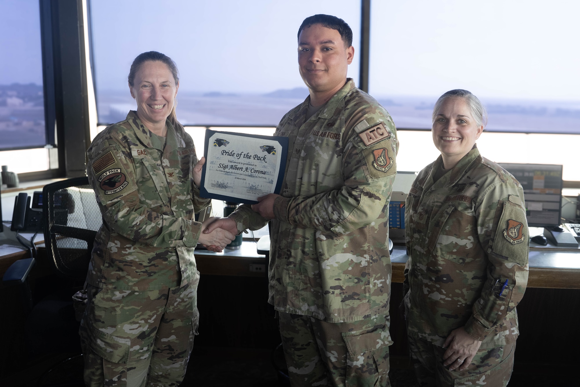 8th FW Command Team celebrate SSgt Corona as Pride of the Pack winner