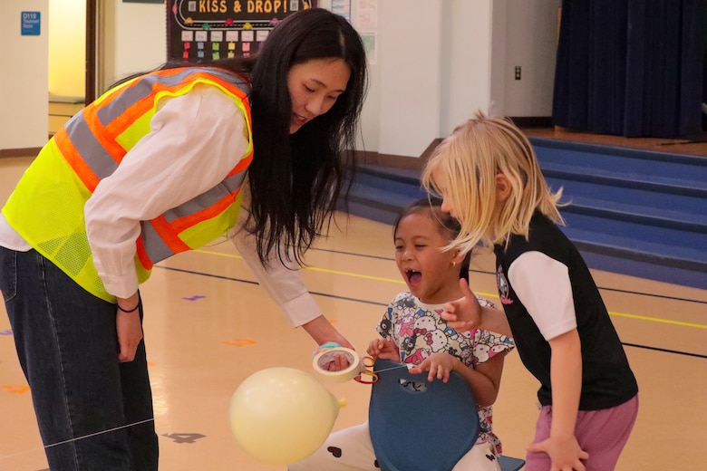 Lee is pictured volunteering for STEAM Day at Osan Elementary School, February 26, 2026, at Osan Air Base, South Korea.