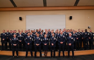 Airmen from the 104th Fighter Wing, 102nd Intelligence Wing, 143rd Airlift Wing and 224th Security Forces Squadron pose for a group photo at the conclusion of the Massachusetts Air National Guard’s inaugural Senior Noncommissioned Officer, or SNCO, Professional Development Course, March 20, 2026, at Camp Nett, Niantic, Connecticut.
