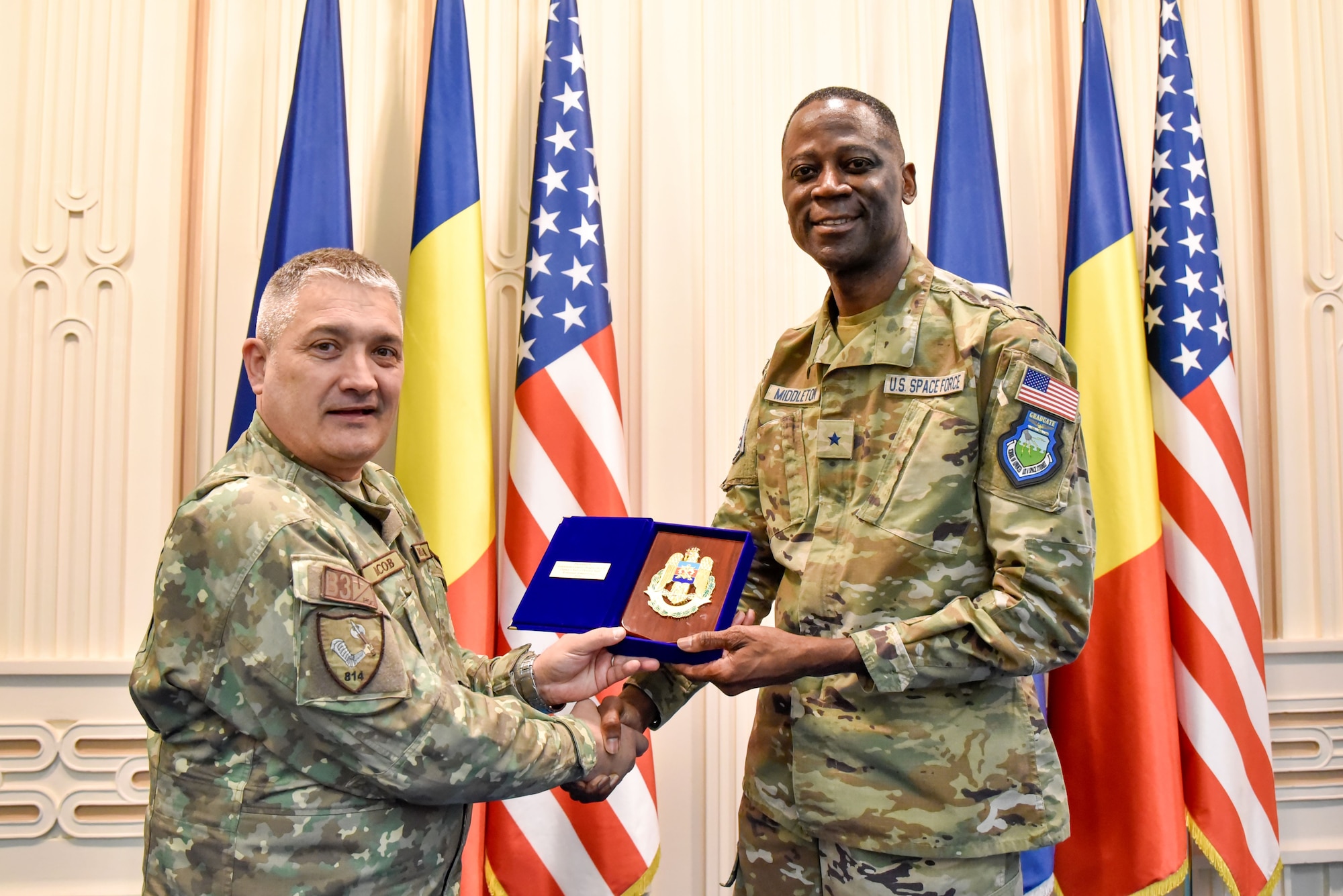 Iacob and Middleton hand off gifts