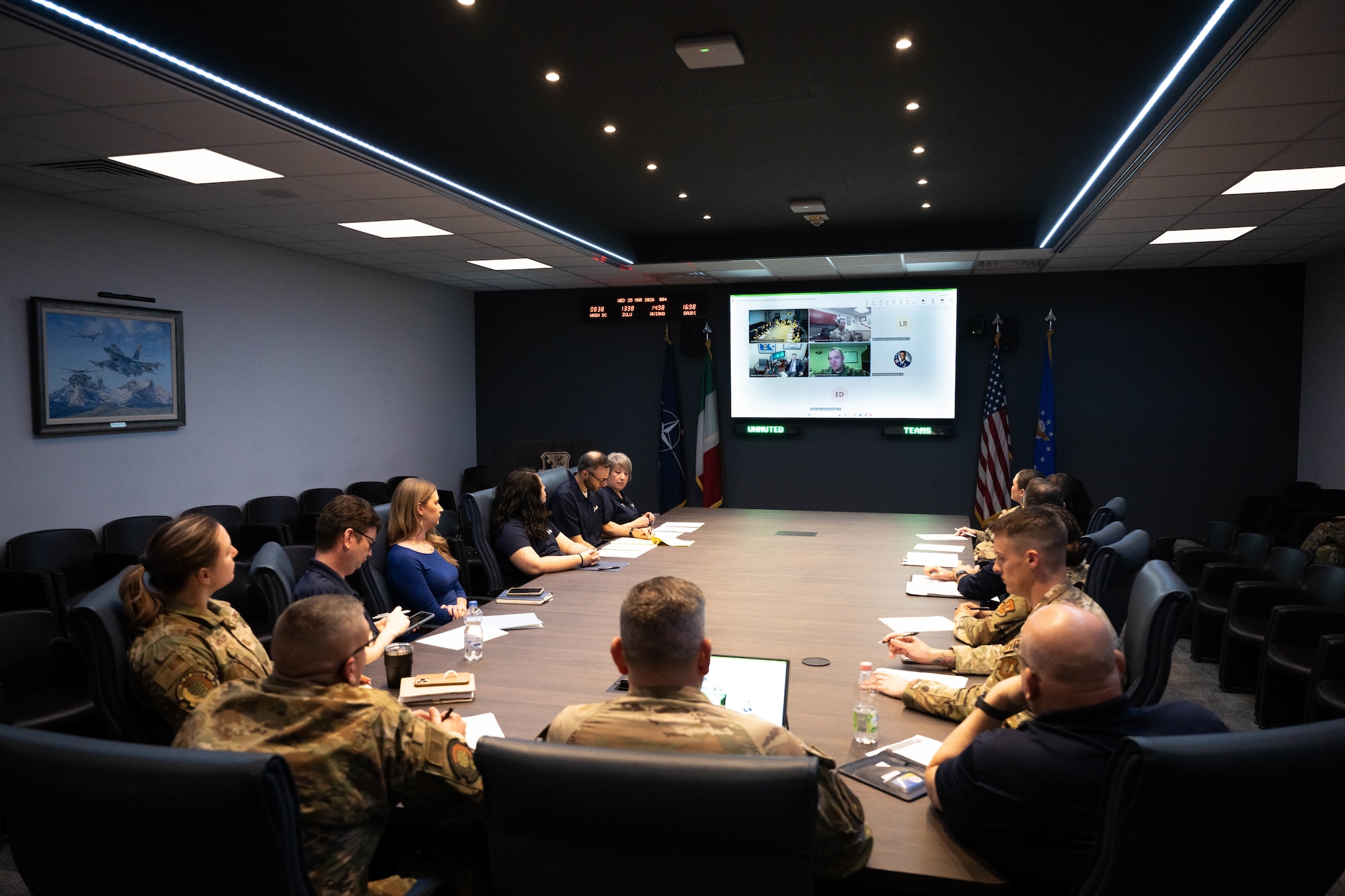 The 31st Force Support Squadron command team and flight chiefs answer questions asked by the Gen. Curtis E. LeMay Award evaluation team during a virtual tour of the 31st FSS at Aviano Air Base, Italy, March 25, 2026.