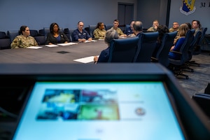 The 31st Force Support Squadron command team and flight chiefs answer questions asked by the Gen. Curtis E. LeMay Award evaluation team during a virtual tour of the 31st FSS at Aviano Air Base, Italy, March 25, 2026.