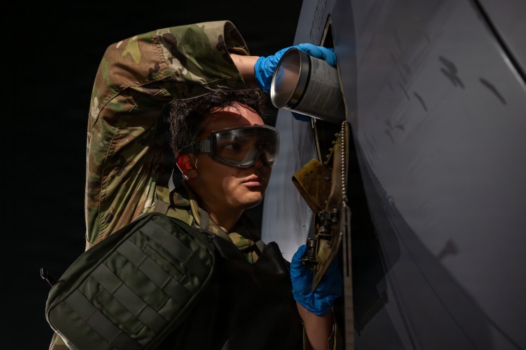 Airman working on aircraft