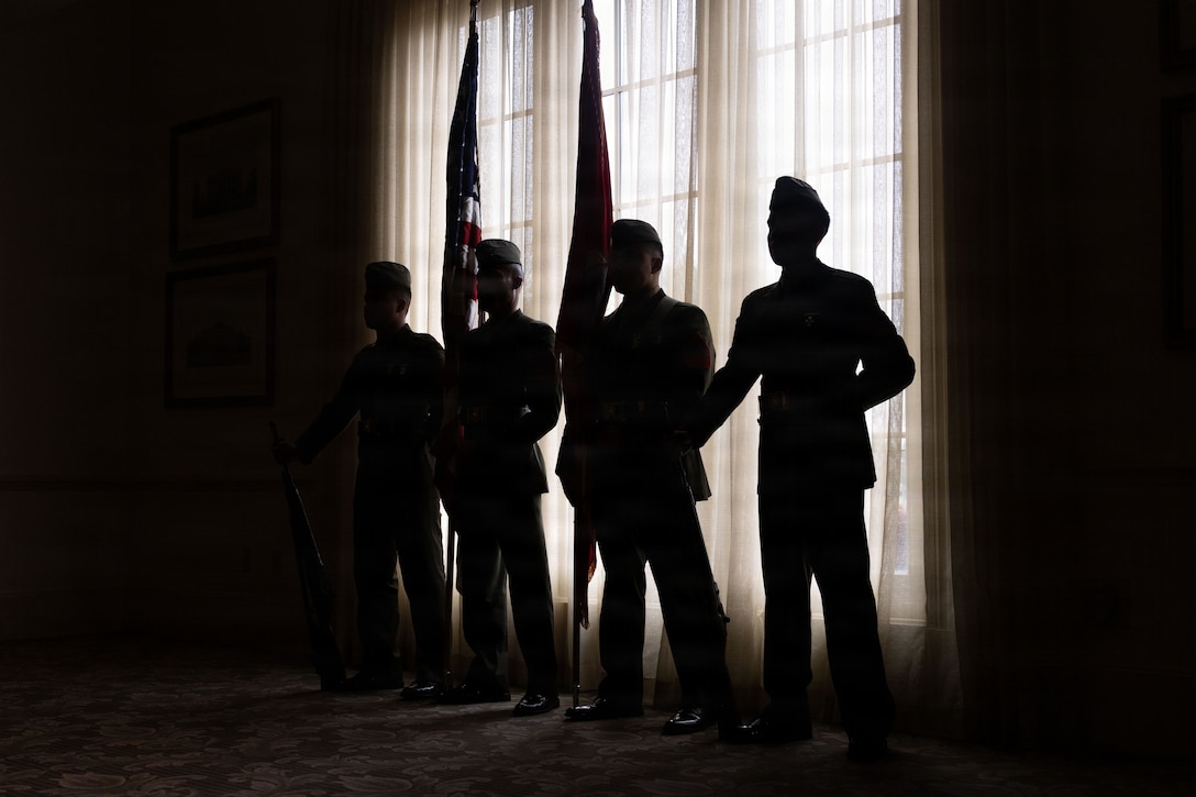 The Marine Forces Reserve Color Guard stand at parade rest during the annual military appreciation day luncheon hosted by the New Orleans Navy League at the Metairie Country Club, Metairie, Louisiana, March 18, 2026. The New Orleans Navy League hosted the event to recognize and award service members in the New Orleans area. (U.S. Marine Corps photo by Lance Cpl. Edward Spears)