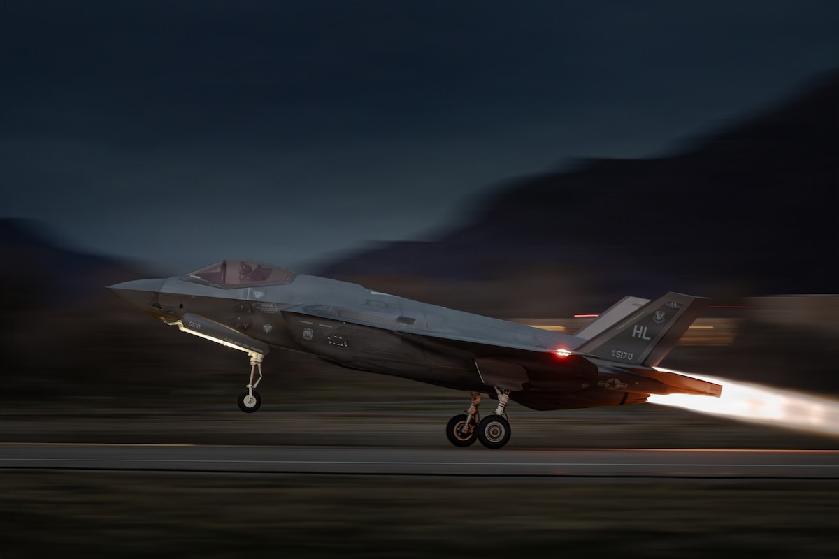 An F-35A Lightning II assigned to the 388th Fighter Wing at Hill Air Force Base, Utah, departs with full afterburner during a night sortie as a part of exercise Lightning Forge at Hill AFB, Utah, March 4, 2026. Lightning Forge, led by the Royal Netherlands air force, enhances interoperability and tactical integration with allied forces. (Royal Netherlands air force photo by Master Sgt. Cristian Schrik)