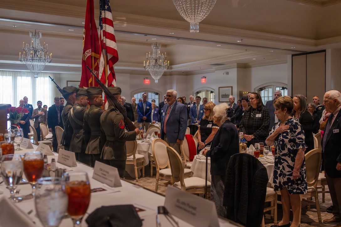 The Marine Forces Reserve Color Guard marches on the colors during the annual military appreciation day luncheon hosted by the New Orleans Navy League at the Metairie Country Club, Metairie, Louisiana, March 18, 2026. The New Orleans Navy League hosted the event to recognize and award service members in the New Orleans area. (U.S. Marine Corps photo by Lance Cpl. Edward Spears)