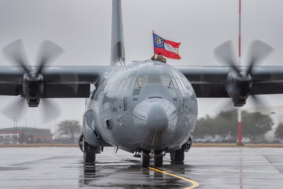 The Georgia Air National Guard's brand new C-130J Super Hercules aircraft, assigned to the 165th Airlift Wing (AW) taxis onto the flight line Jan. 24, 2024 at Savannah Air National Guard Base, Georgia. The 165th AW officially received the first of its eight C-130J Super Hercules tactical airlife aircraft during a ceremont January 22, 2024 at Lockheed Martin in Marietta, Ga. (U.S. Air National Guard Photo by Staff Sgt. Jana Somero)