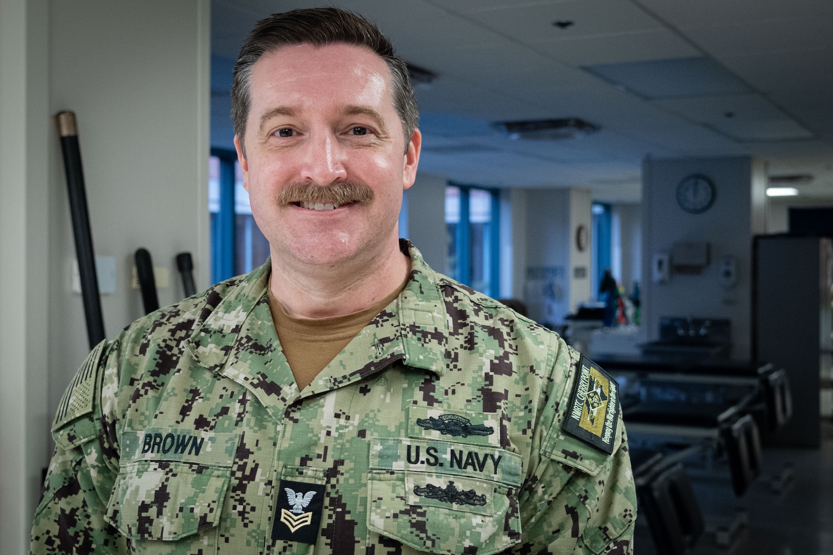 Hospital Corpsman First Class Matthew Brown, a native of Milwaukee, Wisconsin, is a Physical Therapy Technician at Navy Medicine Readiness and Training Command Cherry Point.  He has a vital role in helping injured Sailors and Marines recover from their injuries and maintain their operational readiness.  “Physical Therapy allows us to address these injuries quickly and efficiently by preserving the readiness of our force and getting our Sailors and Marines back on their feet, both literally and figuratively,” said Brown.