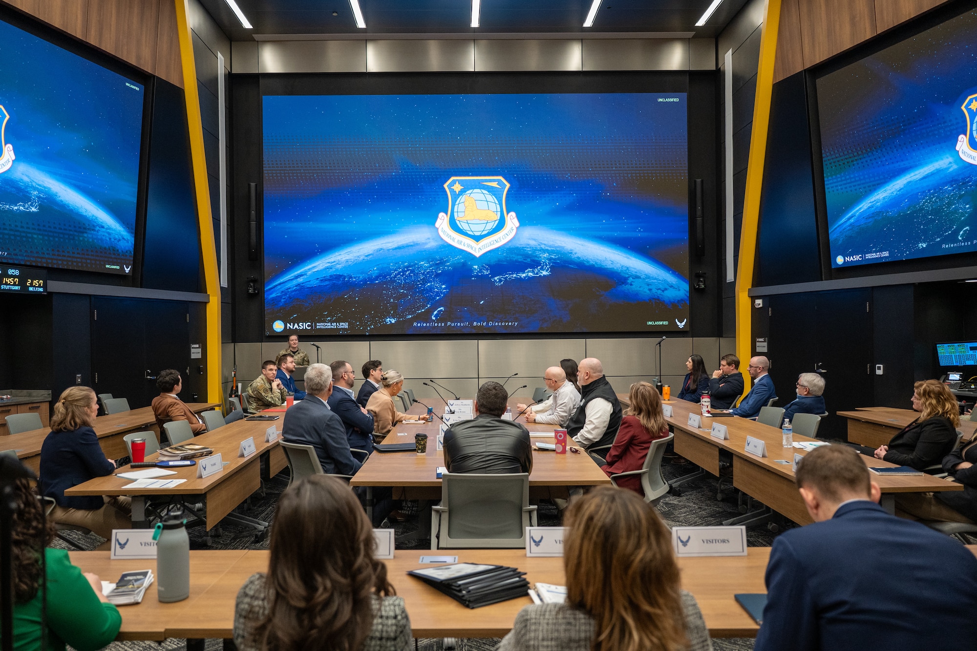 Capt. Amanda Smies, National Air and Space Intelligence Center Commanders Action Group director, briefs a congressional staff delegation at Wright-Patterson Air Force Base, Ohio, Feb. 27, 2026. The visit provided congressional staff with an in-depth understanding of the installation’s integrated mission sets and their direct impact on U.S. strategic priorities.