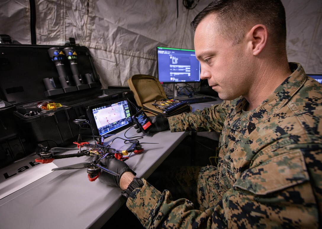 N. Charleston, SC (March 18, 2026) Naval Information Warfare Center (NIWC) Atlantic hosted the Systems of Systems Naval Integration Experiment (SOSNIE) for its 7th year. The two-week experiment stress-tested more than 40 state-of-the-art communications technologies used for a variety of essential military capabilities and included the use of manned and unmanned autonomous systems on land, sea and in the air. More than 150 Sailors, Marines, soldiers, Department of Navy civilians, and industry partners participated in the experiment, which took place in both a field environment at NIWC Atlantic’s Small Autonomous Unmanned Systems Research (SAUSR) Range and off the shore of Sullivan’s Island, South Carolina. (U.S. Navy photo by Joe Bullinger/Released)