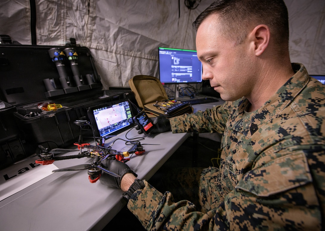 N. Charleston, SC (March 18, 2026) Naval Information Warfare Center (NIWC) Atlantic hosted the Systems of Systems Naval Integration Experiment (SOSNIE) for its 7th year. The two-week experiment stress-tested more than 40 state-of-the-art communications technologies used for a variety of essential military capabilities and included the use of manned and unmanned autonomous systems on land, sea and in the air. More than 150 Sailors, Marines, soldiers, Department of Navy civilians, and industry partners participated in the experiment, which took place in both a field environment at NIWC Atlantic’s Small Autonomous Unmanned Systems Research (SAUSR) Range and off the shore of Sullivan’s Island, South Carolina. (U.S. Navy photo by Joe Bullinger/Released)