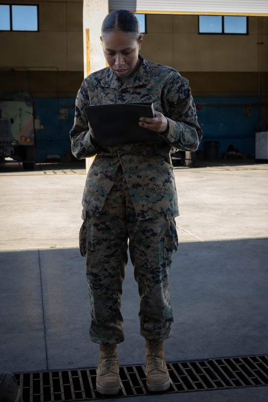 U.S. Marine Corps Lance Cpl. Angelique Skelton, a warehouse clerk with 4th Medical Battalion, 4th Marine Logistics Group, Marine Forces Reserve, takes down gear accountability information on a roster during a Reserve Mobilization Exercise 26, San Diego, March 3, 2026. The week-long exercise validates the battalion’s ability to rapidly activate personnel and equipment, ensuring the unit can deliver ready forces in response to a national crisis. (U.S. Marine Corps photo by Lance Cpl. Claire Cheney)