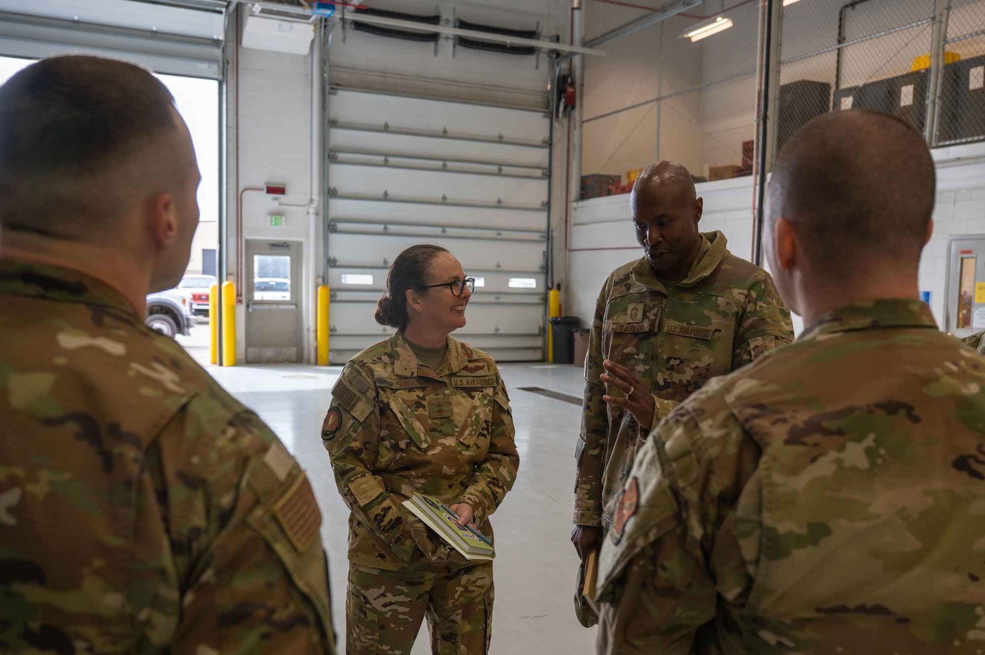 U.S. Air Force Maj. Gen. Stacy Jo Huser, 20th Air Force commander, and Chief Master Sgt. Nicholas Taylor, 20th Air Force command chief, meet with leadership from the 91st Missile Wing at Minot Air Force Base, North Dakota, March 23, 2026. In addition to observing current operations, the command team was briefed on ongoing modernization efforts across the installation. (U.S. Air Force photo by Airman 1st Class Anthony Ramey)