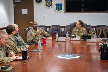 U.S. Air Force Maj. Gen. Stacy Jo Huser, 20th Air Force commander, and Chief Master Sgt. Nicholas Taylor, 20th Air Force command chief, meet with leadership from the 91st Missile Wing at Minot Air Force Base, North Dakota, March 23, 2026. In addition to observing current operations, the command team was briefed on ongoing modernization efforts across the installation. (U.S. Air Force photo by Airman 1st Class Anthony Ramey)