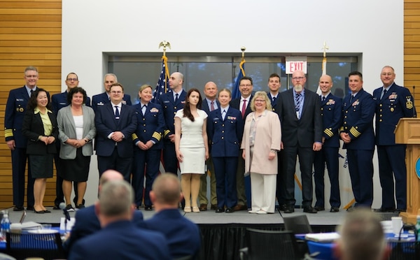 Coast Guard senior leaders and representatives from the winning teams at the annual Capt. Niels P. Thomsen Innovation Awards ceremony.