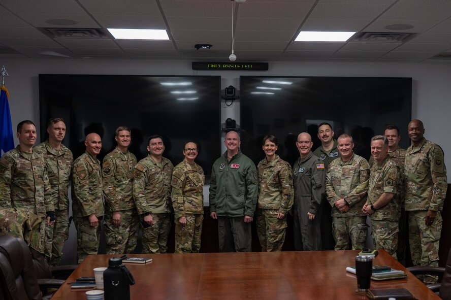 U.S. Air Force Maj. Gen. Stacy Jo Huser, 20th Air Force commander, (center left) and Chief Master Sgt. Nicholas Taylor, 20th Air Force command chief (far right), pose with leadership from the 91st Missile Wing (91MW) at Minot Air Force Base, North Dakota, March 23, 2026. Huser and Taylor’s visit provided an opportunity for the command team to see how the 91MW sustains a state of readiness while operating and maintaining the Minuteman III Intercontinental Ballistic Missile weapon system. (U.S. Air Force photo by Airman 1st Class Anthony Ramey)