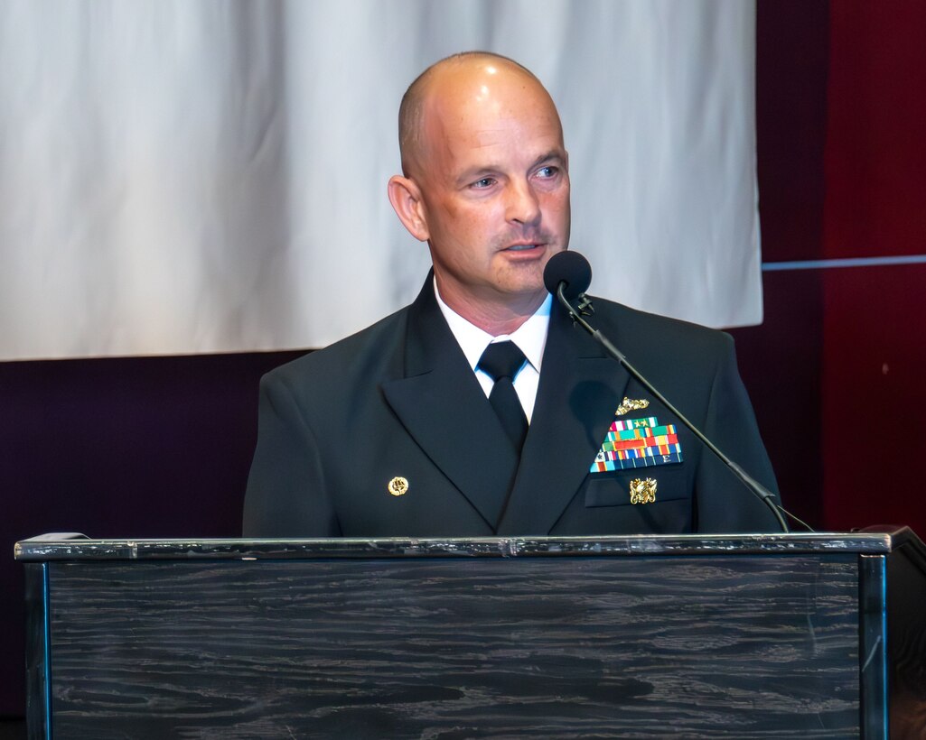 Capt. Paul Stence, Jr., Naval Surface Warfare Center Panama City Division commanding officer, addresses attendees of the Fiscal Year 2025 Annual Awards Ceremony held at Florida State University Panama City, March 26. The ceremony highlights the Navy lab's continued commitment to strengthen the Navy team through technical competency and leadership development. (U.S. Navy photo by Eddie Green)