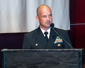 Capt. Paul Stence, Jr., Naval Surface Warfare Center Panama City Division commanding officer, addresses attendees of the Fiscal Year 2025 Annual Awards Ceremony held at Florida State University Panama City, March 26. The ceremony highlights the Navy lab's continued commitment to strengthen the Navy team through technical competency and leadership development. (U.S. Navy photo by Eddie Green)