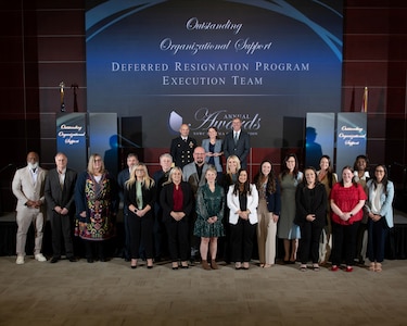 FY25 NSWC PCD Annual Award for Outstanding Organizational Support: Deferred Resignation Program Execution Team -
Larissa Allen, Stefanie Barron, Cecilie Belleville, Kenyatta Bennett, Linda Bland, Victoria Bottorf, Kelly Boyce, Donn Brown, Byron Diltz, Stacy Faison, Whitney Gillman, Eric Kosmoski, Jenica Lolley, Sally Mellen, Theresa Mormile, Corey Patterson, Gretchen Rivera, Jerry Sanlor, Jr., Samantha Snellen, and Rachel Thompson (U.s> Navy photo by Eddie Green)