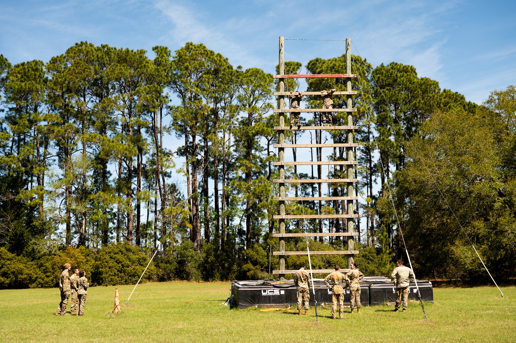 Joint Base Charleston Airmen participate in a confidence climb during the Airman Leadership School field training exercise at the Marine Corps Recruiting Depot, Parris Island, South Carolina.