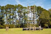 Joint Base Charleston Airmen participate in a confidence climb during the Airman Leadership School field training exercise at the Marine Corps Recruiting Depot, Parris Island, South Carolina.