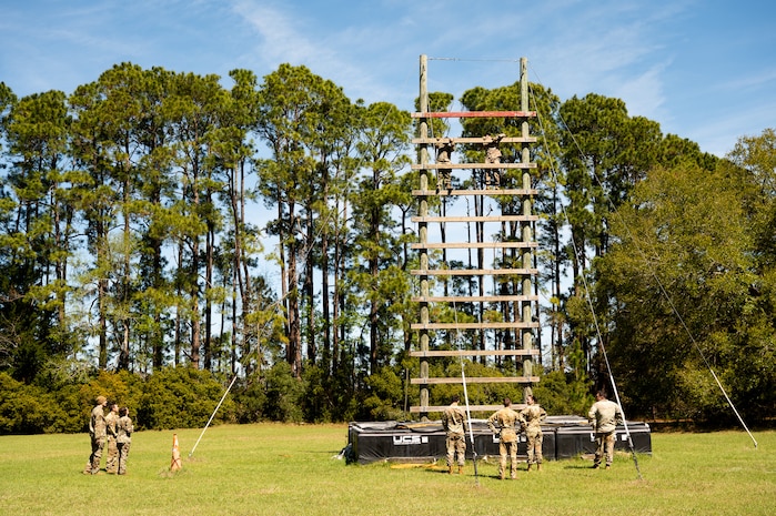 Joint Base Charleston Airmen participate in a confidence climb during the Airman Leadership School field training exercise at the Marine Corps Recruiting Depot, Parris Island, South Carolina.