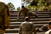 U.S. Air Force Senior Airman Adrian Pena, 437th Maintenance Group aerospace ground equipment specialist, participates in the weaver obstacle course during the Airman Leadership School field training exercise at the Marine Corps Recruiting Depot, Parris Island, South Carolina.